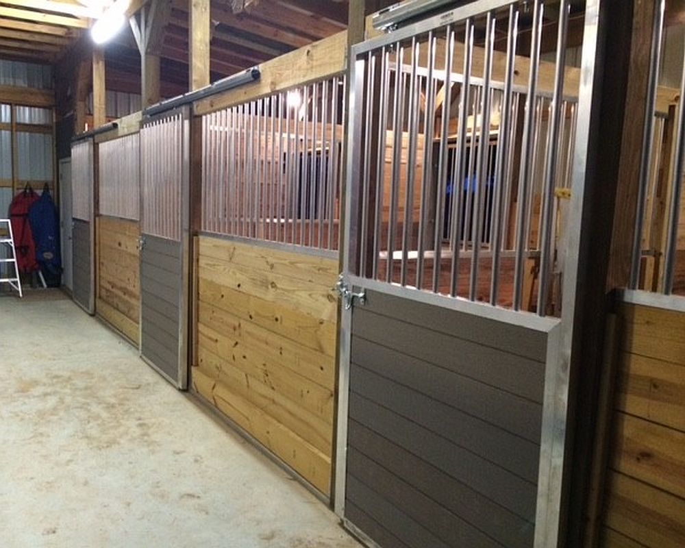 Aluminum sliding horse stall doors.