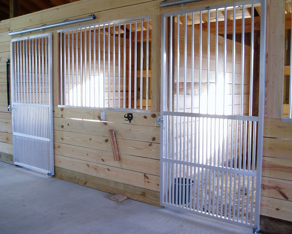 Coolbreeze aluminum horse stall sliding door and front grill.