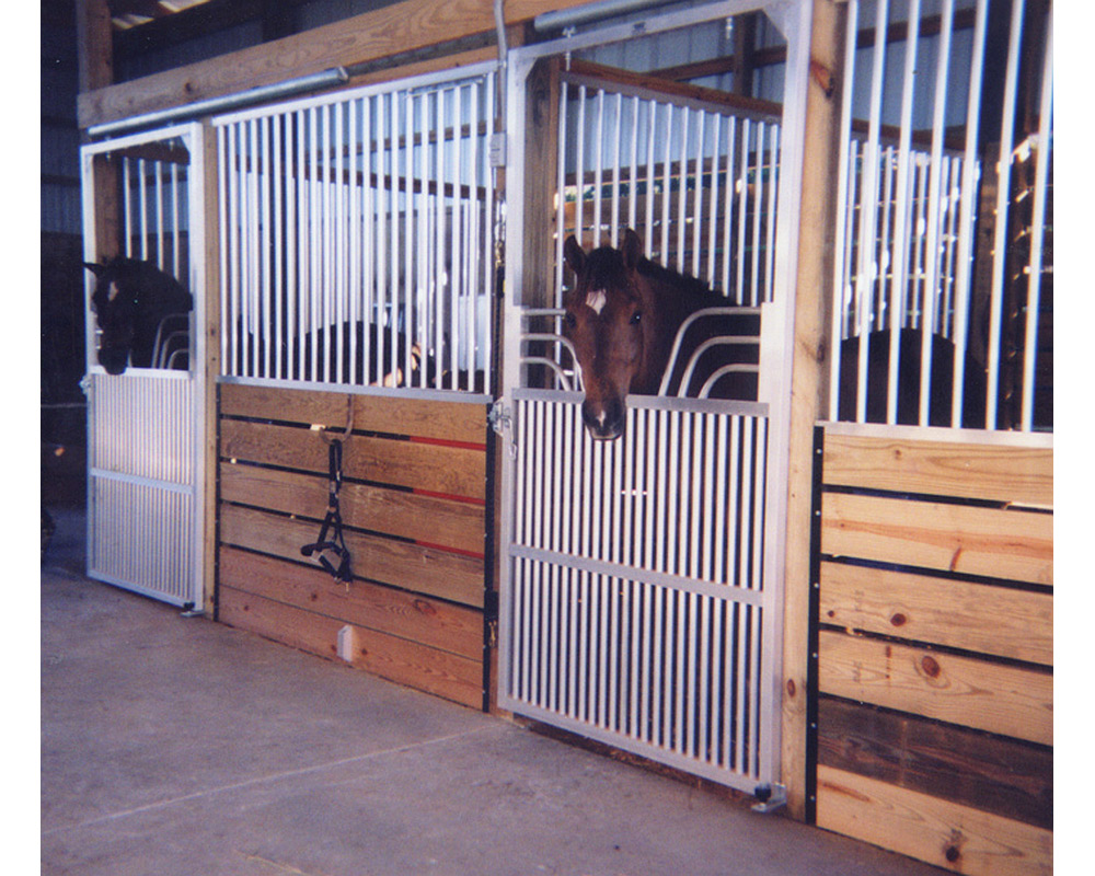 Horse stall front with gossip top coolbreeze sliding door and aluminum grills.