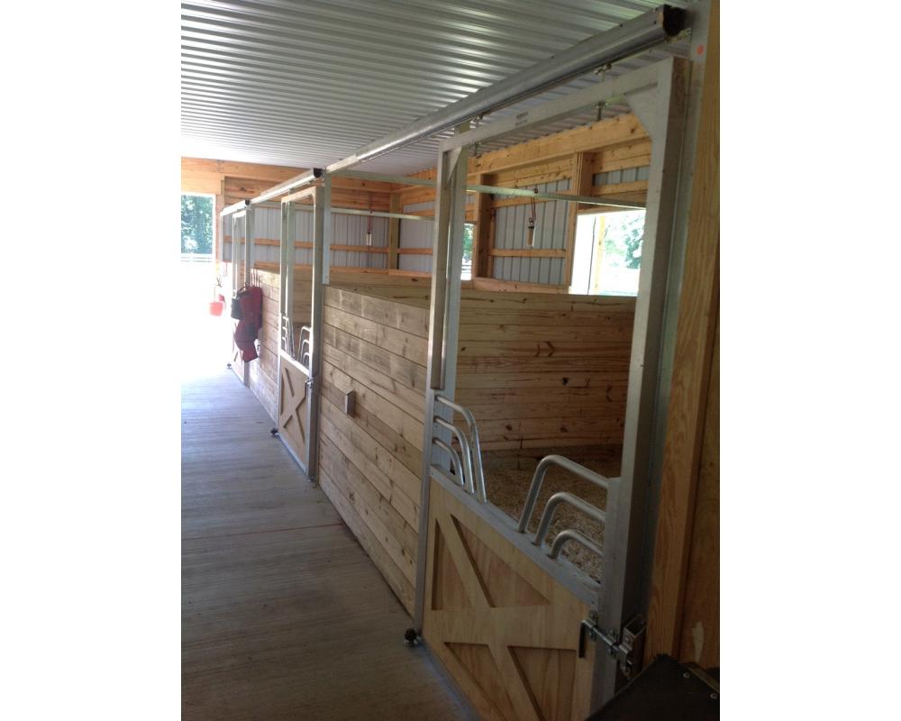 Miniature horse sliding stall doors.