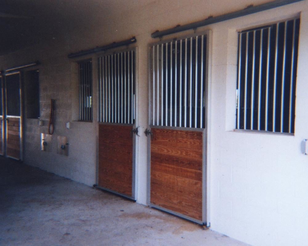 Tongue and Groove sliding stall doors.