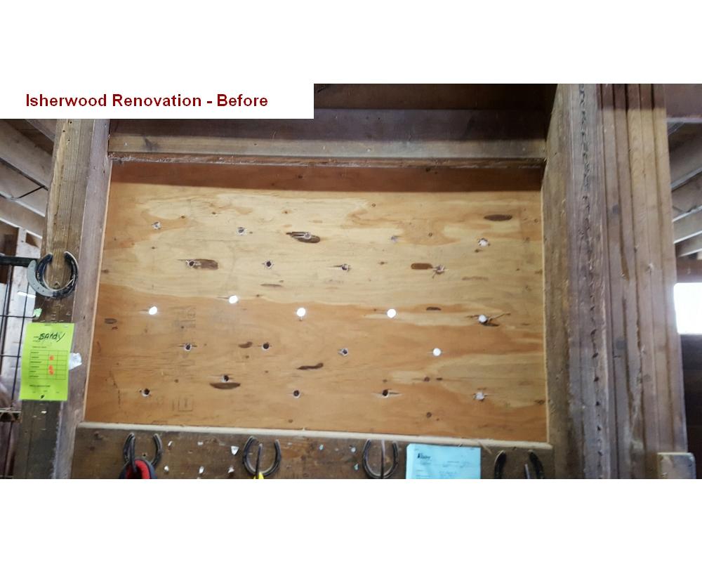 Lumber panel divider before horse stall renovation.
