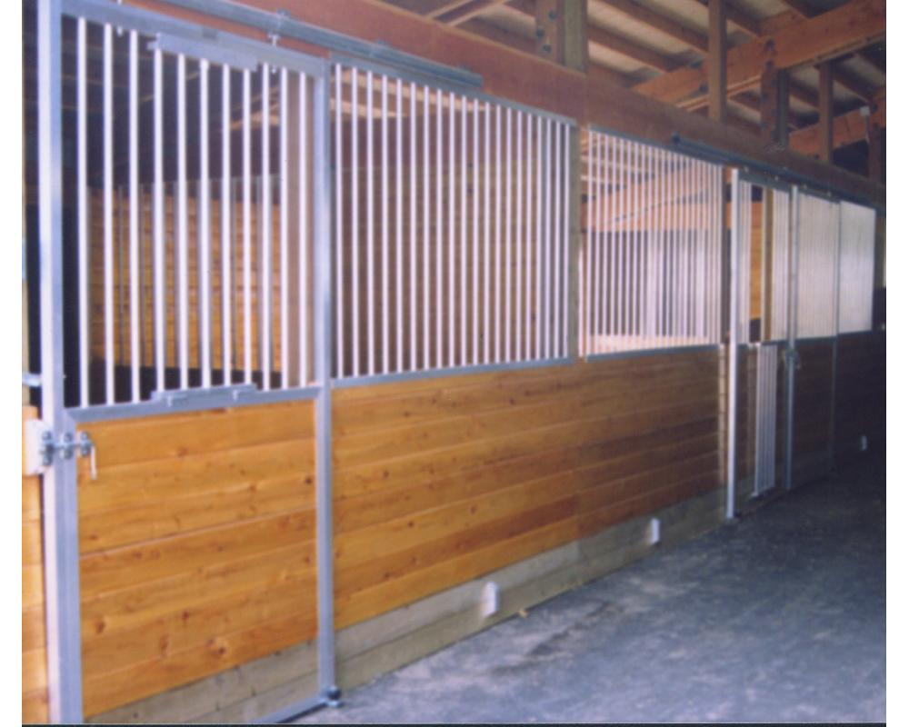 Horse stall front grills and sliding doors.