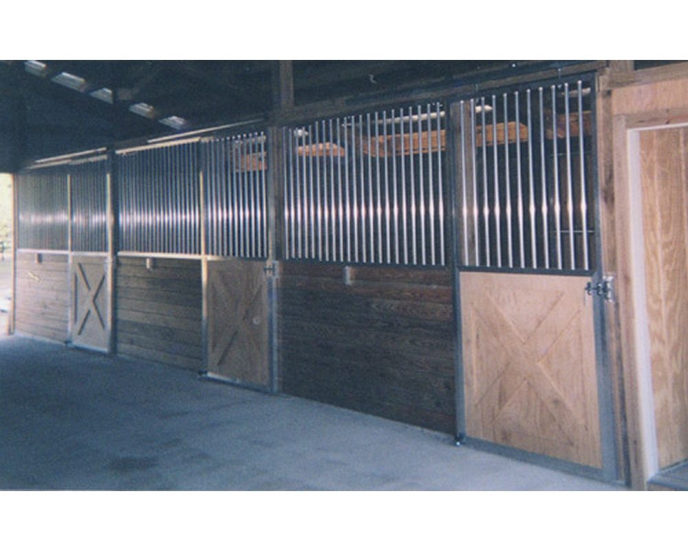 Crossbuck sliding stall doors and stall front grills.