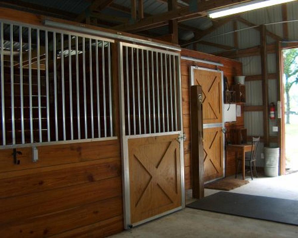 Crossbuck sliding horse stall door.
