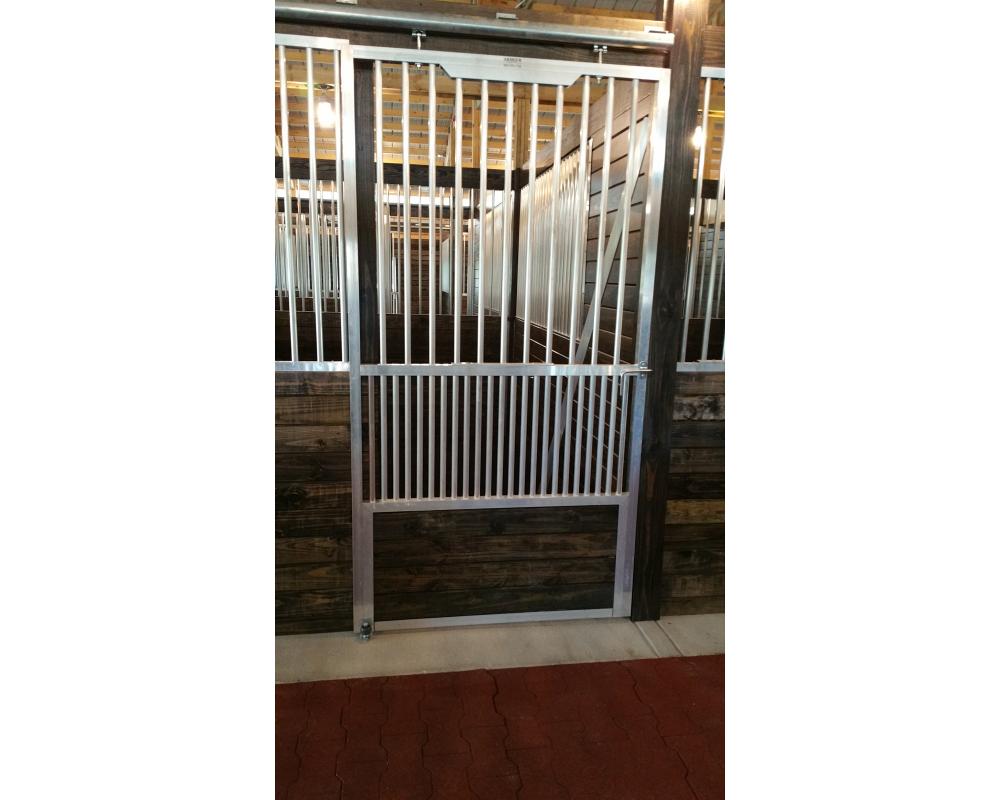 Sliding horse stall door with removable lift out panel.