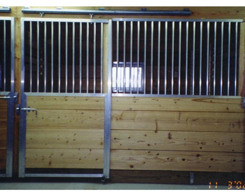 Sliding door superstructure and stall front grill.