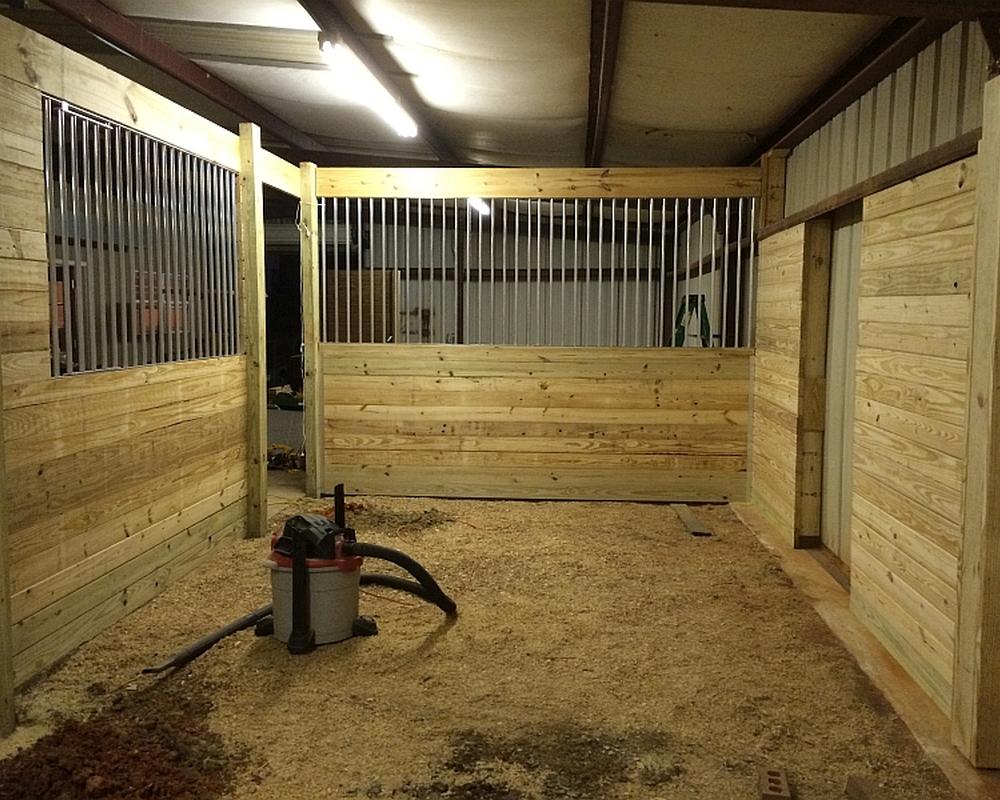 Aluminum grills for added ventilation in horse stalls.