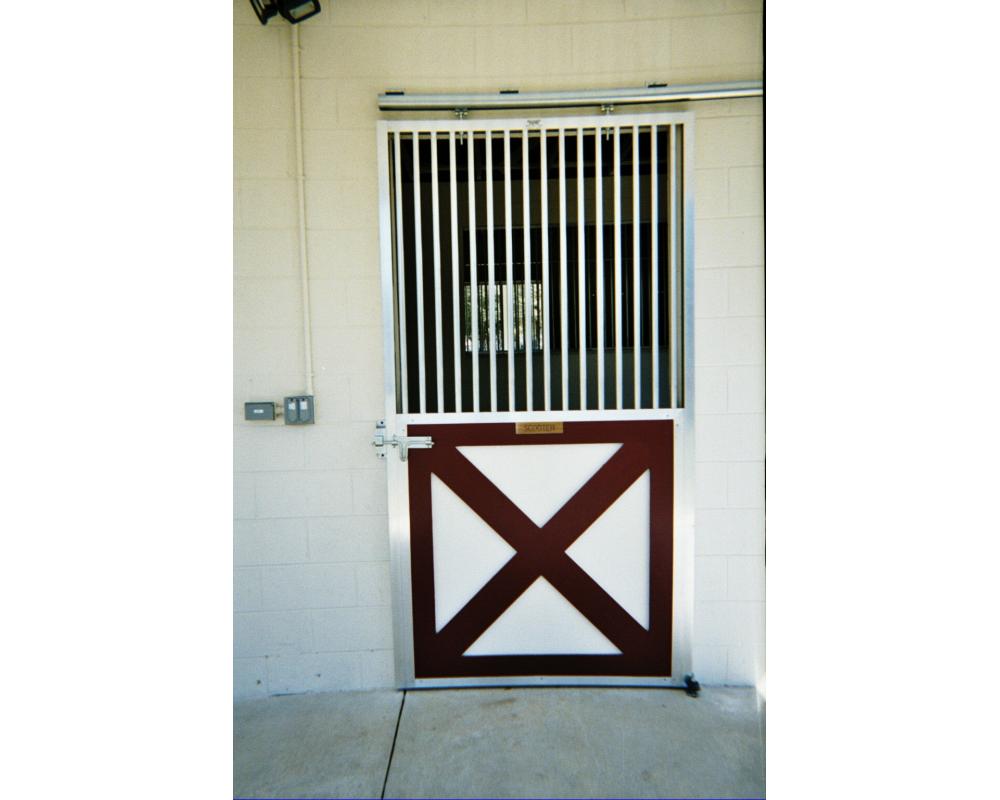 Sliding horse stall door with ultra 2" between bar spacing.