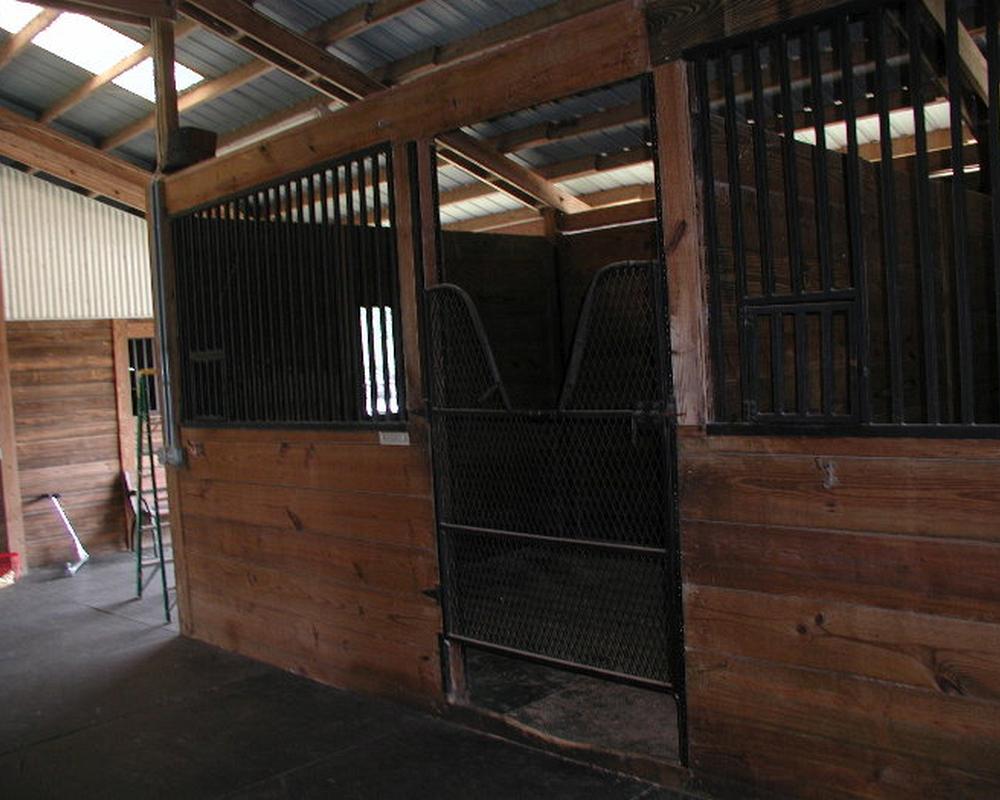 Old rusty iron stall products before being renovated.