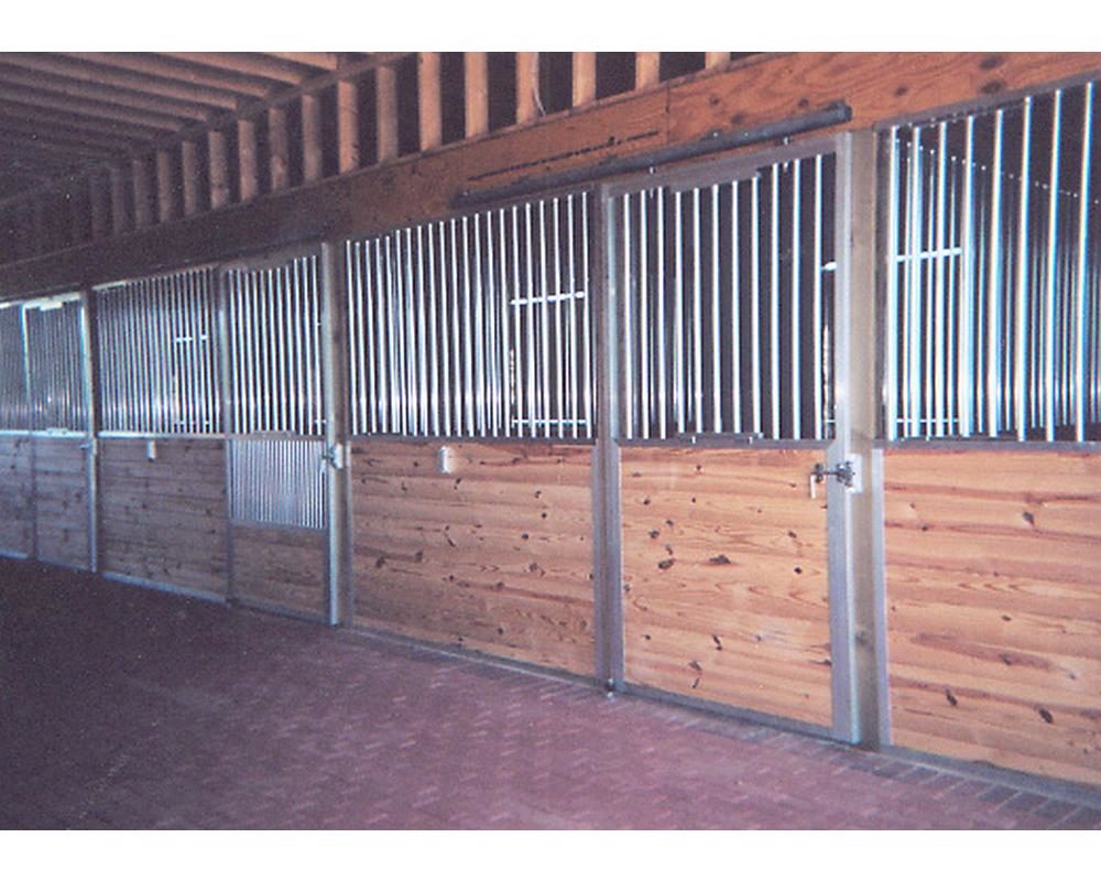 Aluminum and lumber horse stall fronts.
