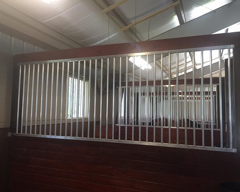 Aluminum horse stall divider grill.