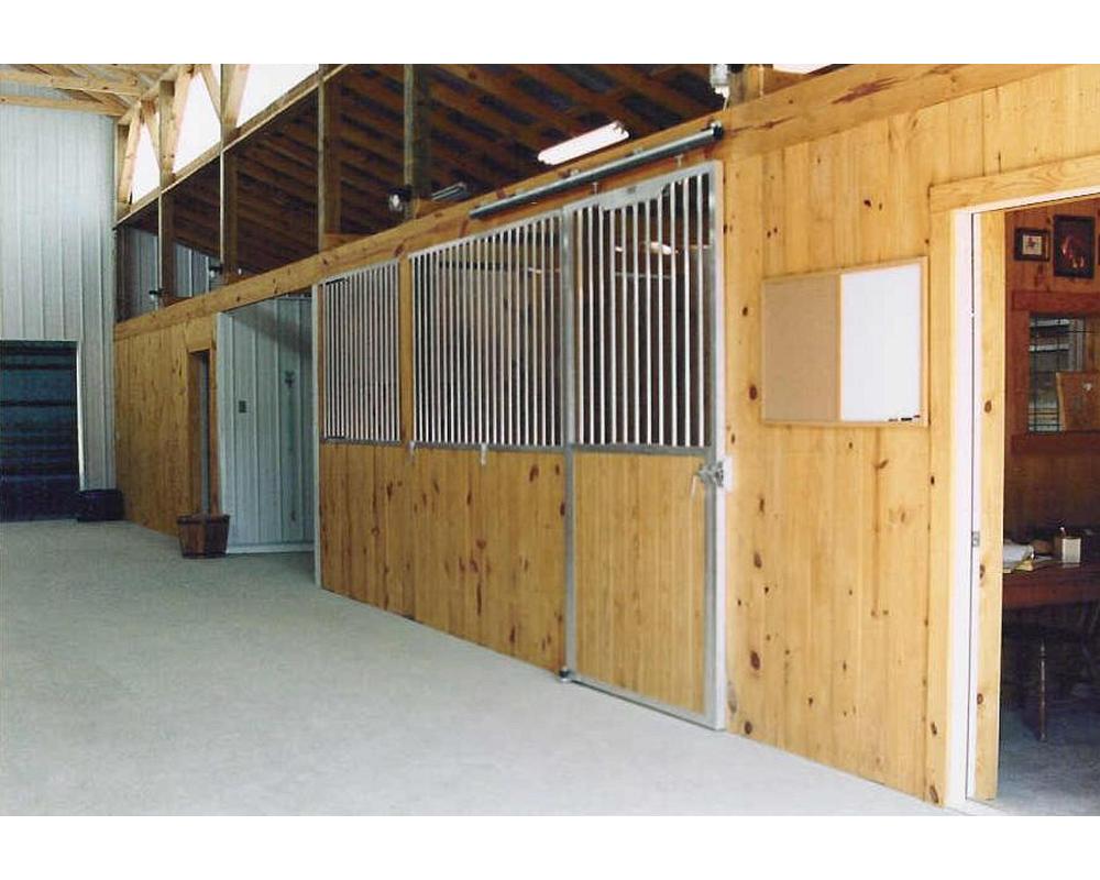 Aluminum horse sliding doors and stall front grills.