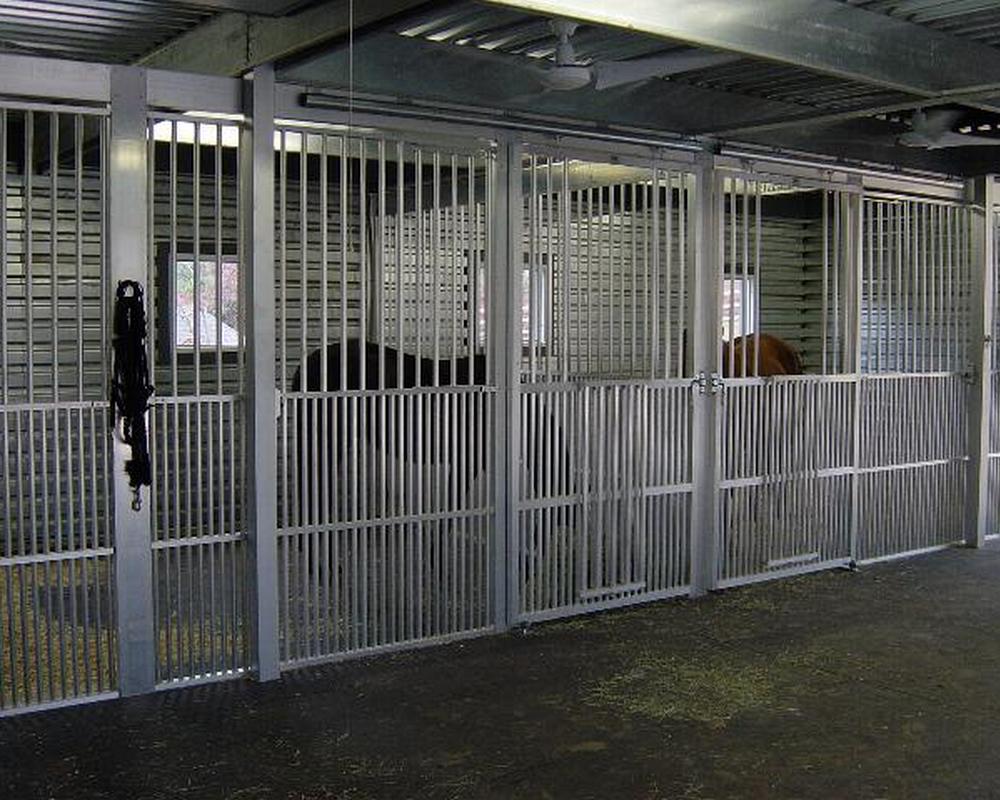 Aluminum ventilated horse stalls.
