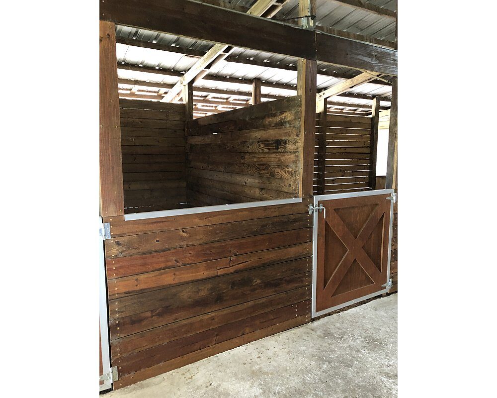Horse Stall Front with Crossbuck Sliding Door with Spring Loaded Fold Down Panel and Horse Stall Front Grill.