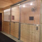 Horse Stalls Fronts using Sliding Stall Door Superstructures with Standard Bar Top