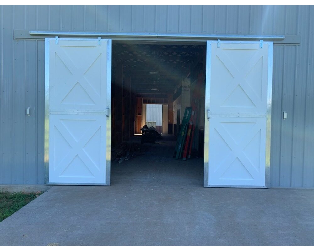 Endura not split sliding end barn crossbuck doors.