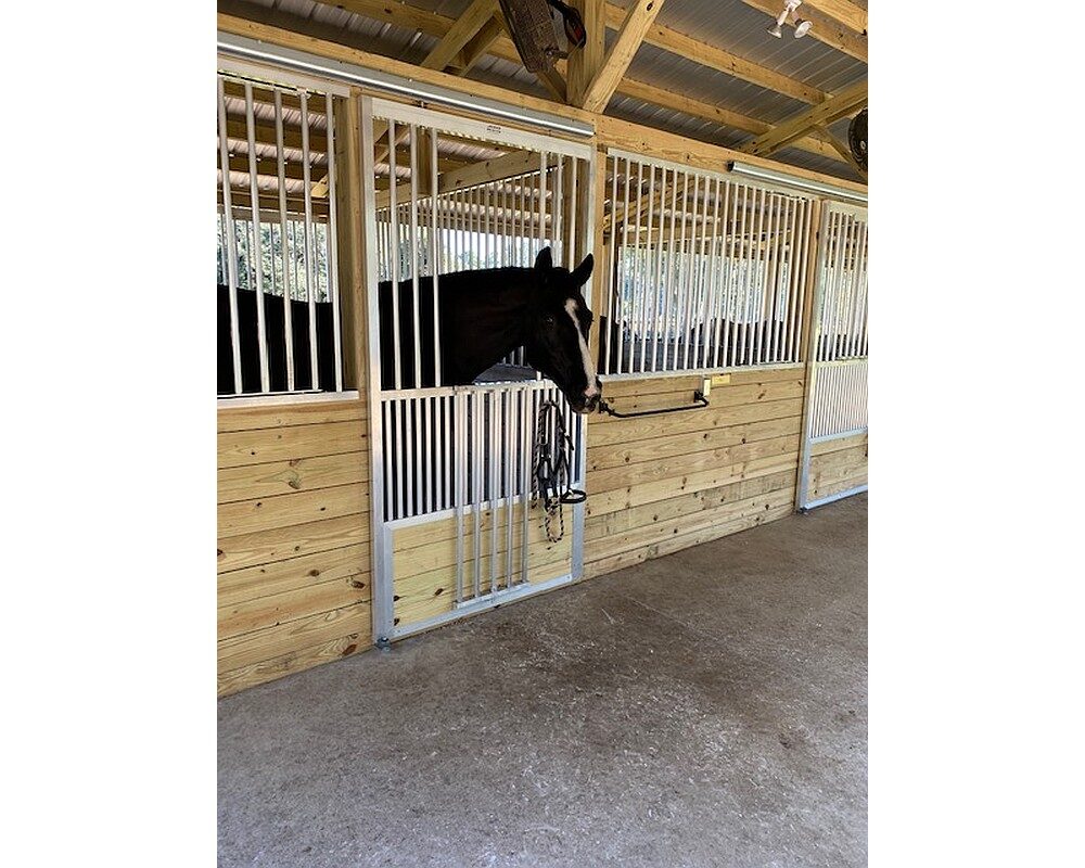 Hunt Stables, coolbreeze sliding stall door with scuff panel and fold down panel top.