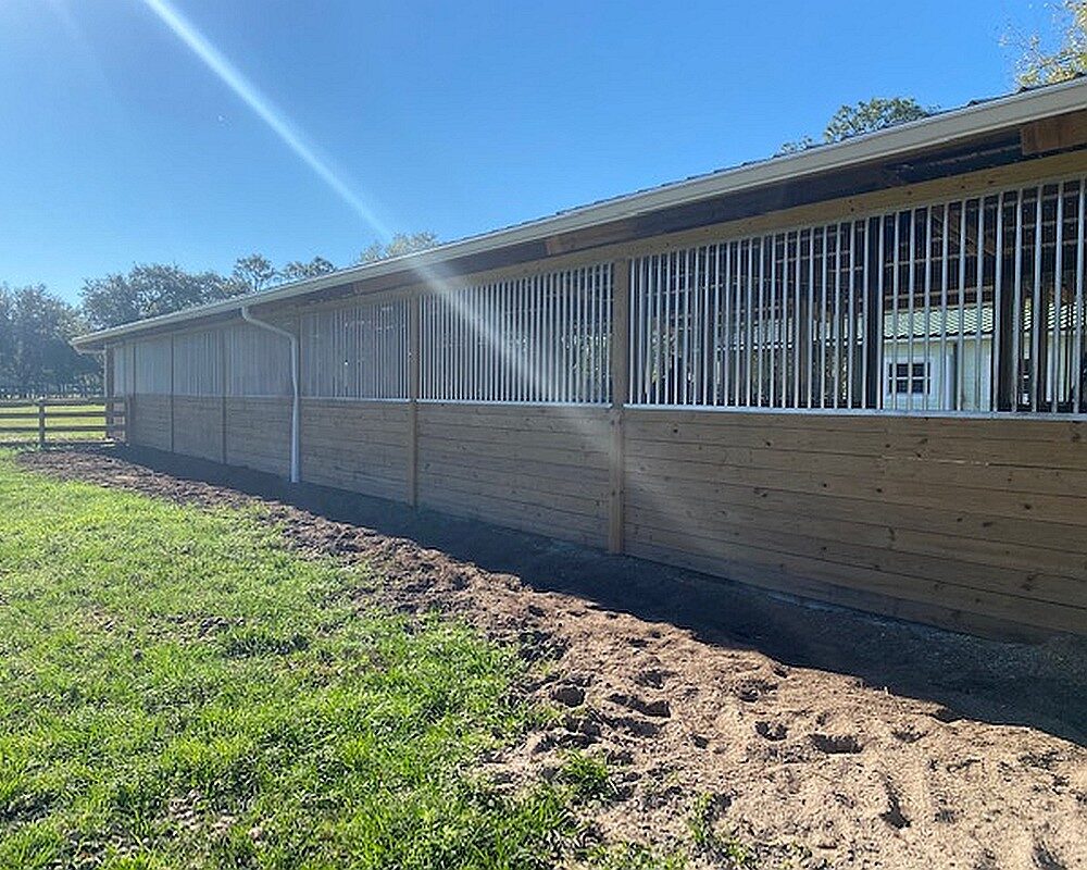 Hunt stables, located in Florida, featuring Armour Horse Stalls.